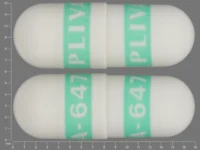 Pill with imprint PLIVA 647 PLIVA 647, white, capsule, 16 mm (Fluoxetine 10 mg)