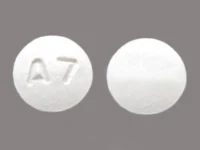 Pill with imprint A7, white, round, 6 mm (Anastrozole 1 mg)