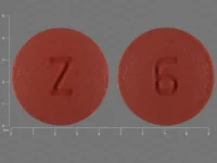 Pill with imprint Z 6, red, round, 5 mm (Risperidone 0.5 mg)