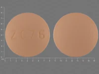 Pill with imprint ZC 76, orange, round, 8 mm (Risperidone 2 mg)