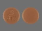 Pill with imprint 312 B, brown, round, 9 mm (Doxycycline Hyclate 100 mg)