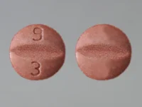 Pill with imprint 9 3, brown, round, 7 mm (Pramipexole Dihydrochloride 0.5 mg)