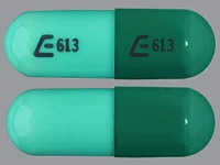 Pill with imprint E 613, green, capsule, 16 mm (Hydroxyzine Pamoate 25 mg)