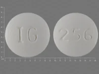 Pill with imprint IG 256, white, round, 9 mm (Raloxifene 60 mg)