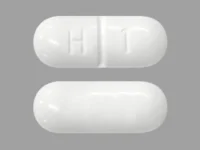 Pill with imprint H 1, white, capsule, 20 mm (Methenamine Hippurate 1000 mg)