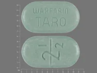 Pill with imprint 2 12 WARFARIN TARO, green, oval, 11 mm (Warfarin Sodium 2.5 mg)