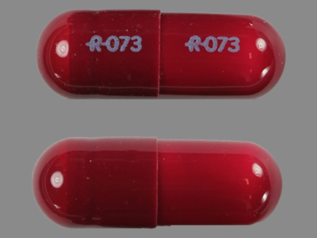 Pill with imprint R 073, brown, capsule, 14 mm (Oxazepam 30 mg)