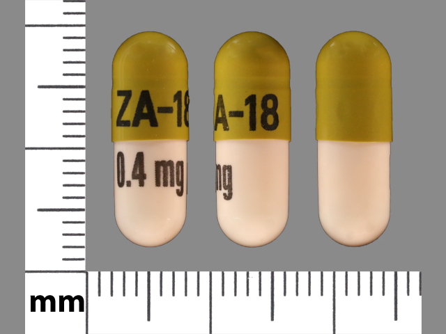 Pill with imprint ZA 18 0 4mg, green & orange, capsule, 18 mm (Tamsulosin Hydrochloride 0.4 mg)