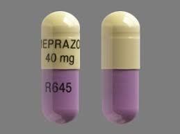 Pill with imprint OMEPRAZOLE40mg R645, purple & yellow, capsule, 19 mm (Omeprazole 40 mg)