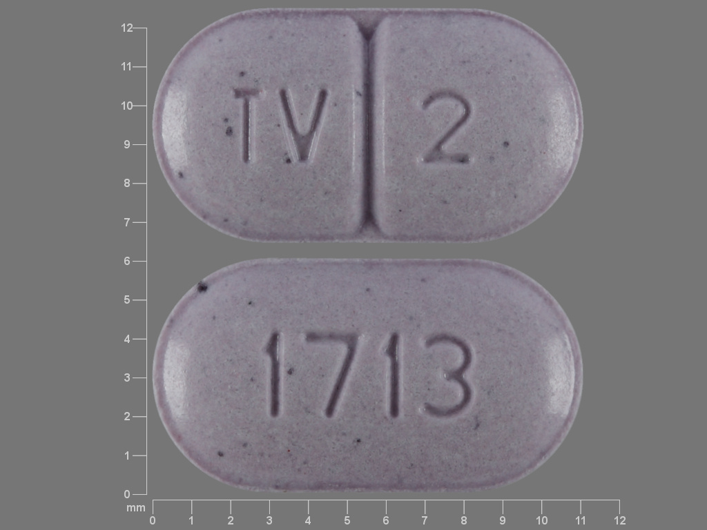 Pill with imprint TV 2 1713, purple, oval, 11 mm (Warfarin Sodium 2 mg)