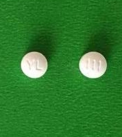 Pill with imprint YL 111, white, round, 6 mm (Anastrozole Tablets 1 mg)