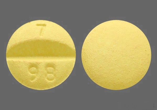 Pill with imprint 7 98, yellow, round, 8 mm (Labetalol Hydrochloride 100 mg)