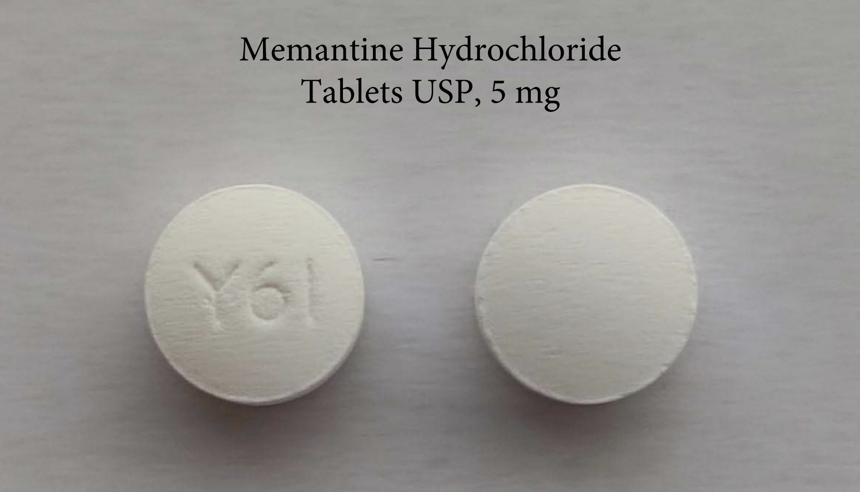 Pill with imprint Y61, white, round, 6 mm (Memantine Hydrochloride 5 mg)