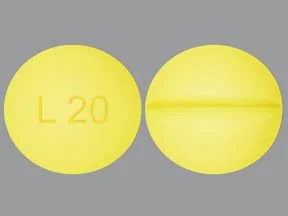 Pill with imprint L20, yellow, round, 6 mm (Levothyroxine Sodium 0.1 mg)