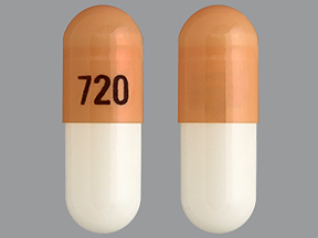 Pill with imprint 720, orange & white, capsule, 19 mm (Budesonide 3 mg)