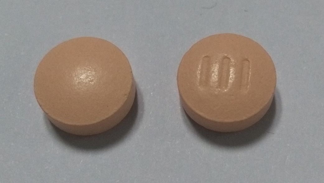 Pill with imprint 111, pink, round, 9 mm (Clopidogrel 75 mg)