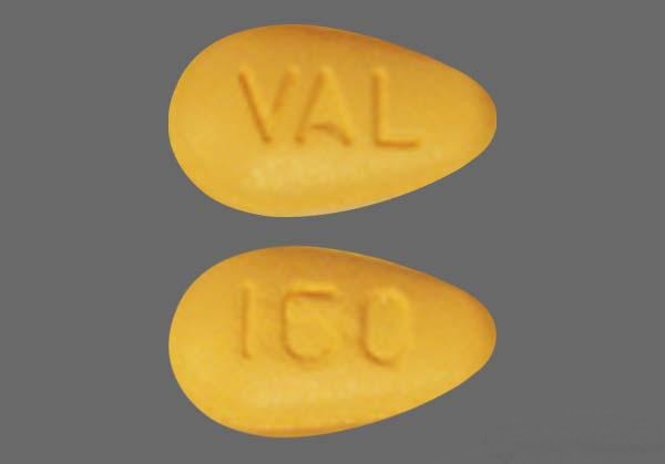 Pill with imprint 160 VAL, gray & orange, oval, 14 mm (Valsartan 160 mg)