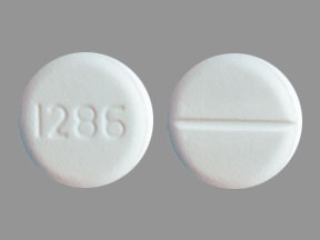 Pill with imprint 1286, white, round, 10 mm (Baclofen 20 mg)