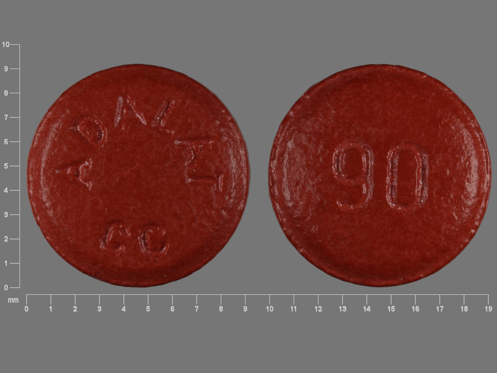 Pill with imprint 90 ADALAT CC, pink, round, 15 mm (Nifedipine 90 mg)