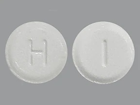 Pill with imprint H I, white, round, 5 mm (Roflumilast 500 mcg)