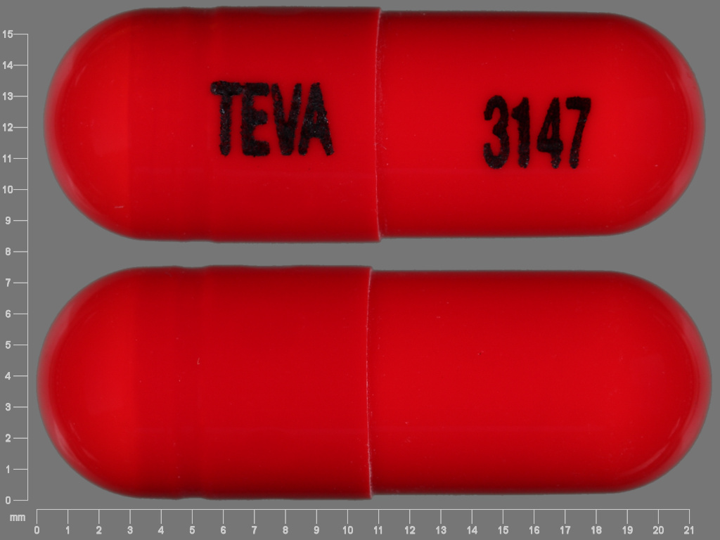 Pill with imprint TEVA 3147, orange, capsule, 22 mm (Cephalexin 500 mg)