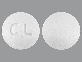 Pill with imprint CL, white, round, 7 mm (Clonidine Hydrochloride 0.1 mg)