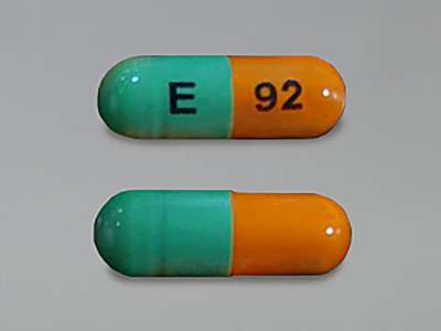 Pill with imprint E 92, green & orange, capsule, 18 mm (Fluoxetine 40 mg)