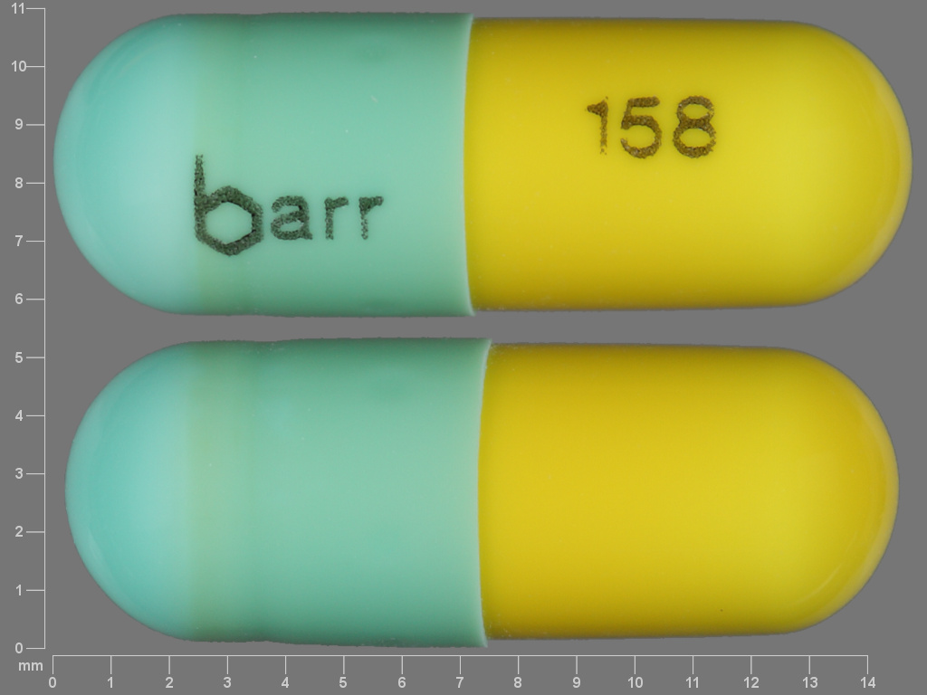 Pill with imprint barr 158, green & yellow, capsule, 14 mm (Chlordiazepoxide Hydrochloride 5 mg)