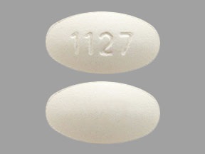Pill with imprint 1127, white, oval, 15 mm (Ursodiol 250 mg)