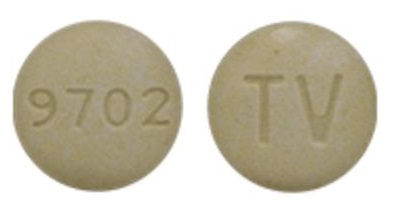 Pill with imprint TV 9702, yellow, round, 9 mm (Carbidopa and Levodopa Carbidopa Anhydrous 25 mg / Levodopa 100 mg)