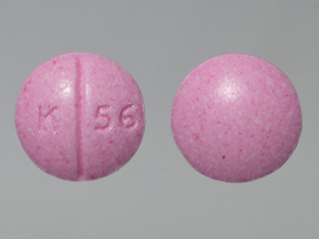Pill with imprint K 56, pink, round, 6 mm (Oxycodone Hydrochloride 10 mg)