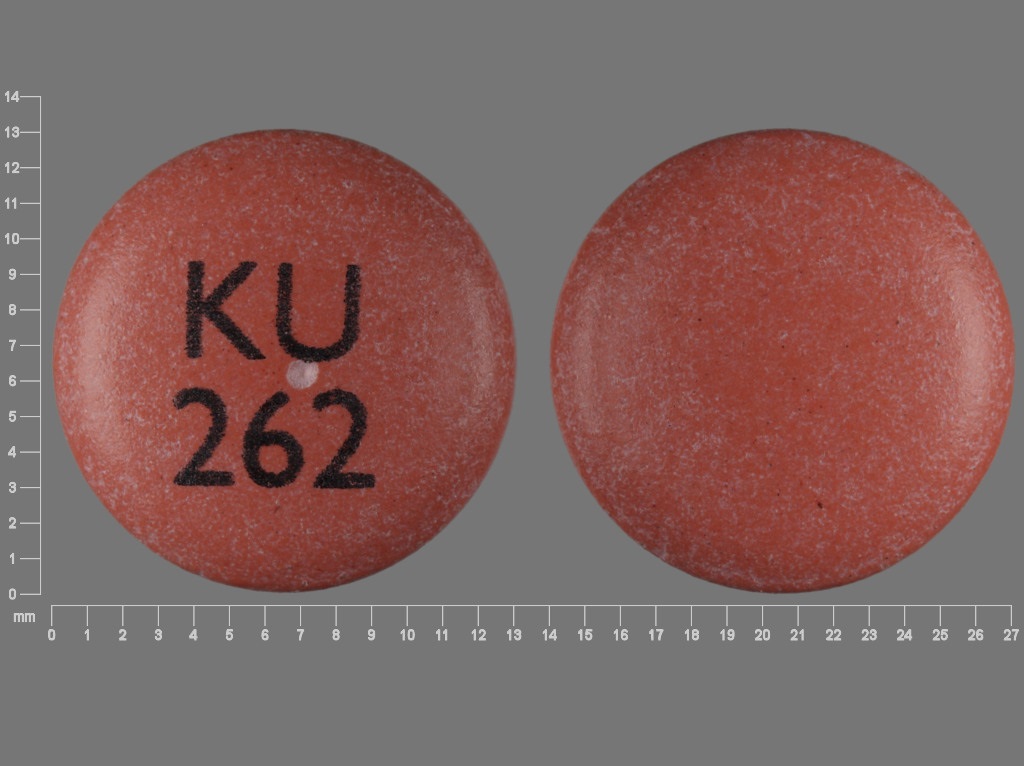 Pill with imprint KU 262, pink, round, 12 mm (Nifedipine 90 mg)