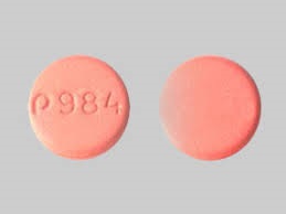 Pill with imprint P 984, pink, round, 1 mm (Nateglinide 60 mg)