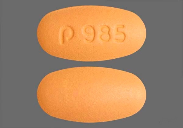 Pill with imprint P 985, orange, oval, 6 mm (Nateglinide 120 mg)
