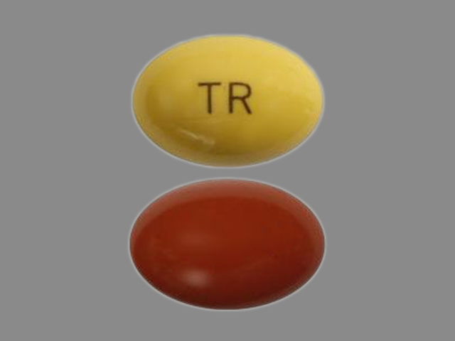 Pill with imprint TR, brown & yellow, capsule, 9 mm (Tretinoin 10 mg)