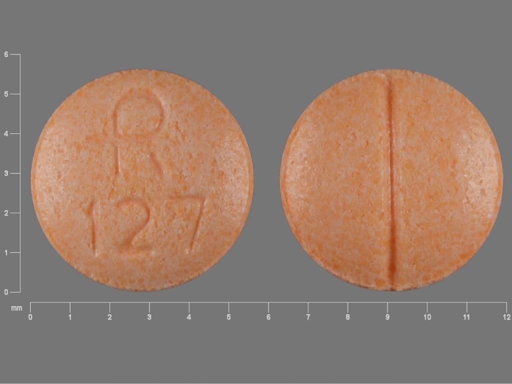 Pill with imprint R127, orange, round, 6 mm (Clonidine Hydrochloride 0.1 mg)