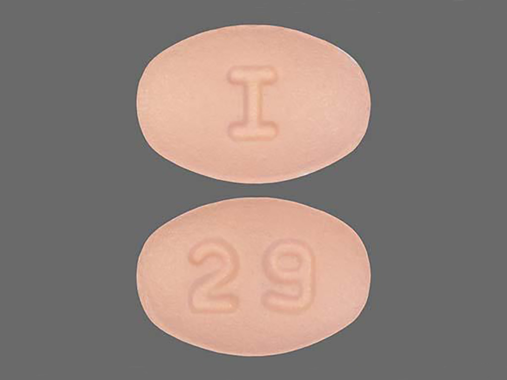 Pill with imprint I 29, pink, oval, 6 mm (Rosuvastatin Calcium 5 mg)