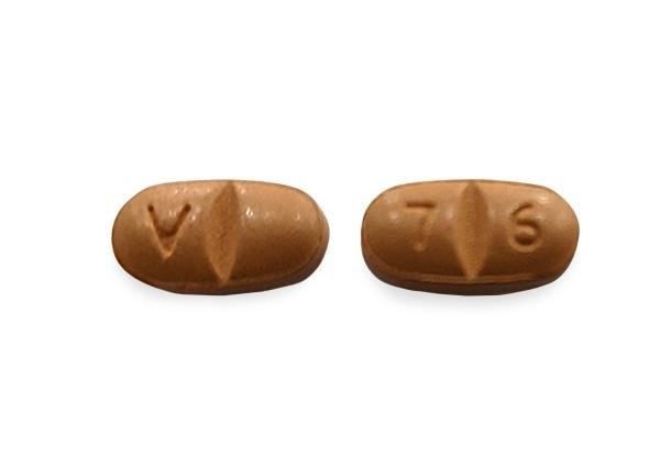 Pill with imprint V 7 6, brown, oval, 4 mm (Oxcarbazepine 150 mg)