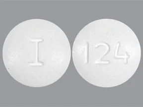 Pill with imprint I 124, white, round, 9 mm (Metronidazole 250 mg)