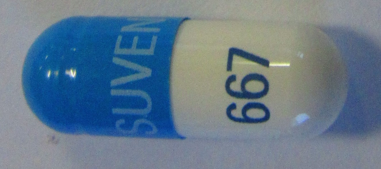 Pill with imprint Suven 667, blue & white, capsule, 22 mm (Calcium Acetate 667 mg)