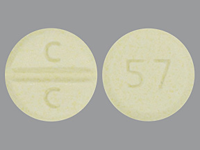 Pill with imprint C C 57, yellow, round, 10 mm (Clozapine 100 mg)