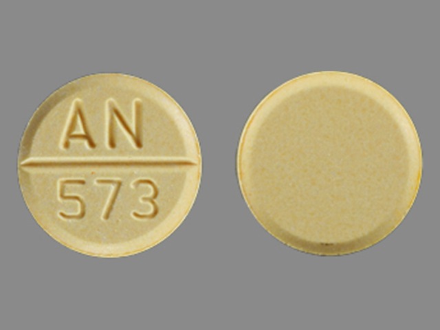 Pill with imprint AN 573, yellow, round, 11 mm (Bethanechol Chloride 25 mg)