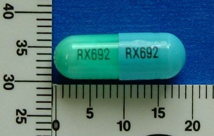 Pill with imprint RX692, blue & green, capsule, 19 mm (Clindamycin Hydrochloride 150 mg)