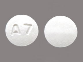Pill with imprint A7, white, round, 6 mm (Anastrozole 1 mg)