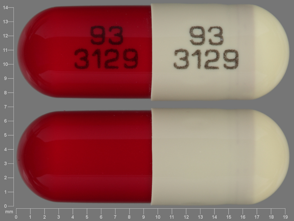 Pill with imprint 93 3129 93 3129, brown & red, capsule, 19 mm (Disopyramide Phosphate 150 mg)