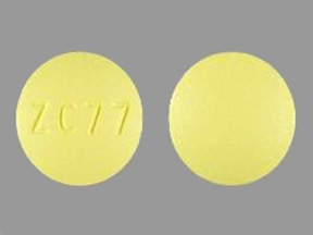 Pill with imprint ZC 77, yellow, round, 10 mm (Risperidone 3 mg)